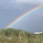 Regenbogen über dem Strandhotel Dünenmeer